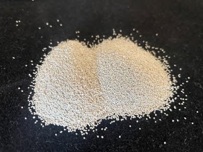 Lotus Matter sample particles in a vial